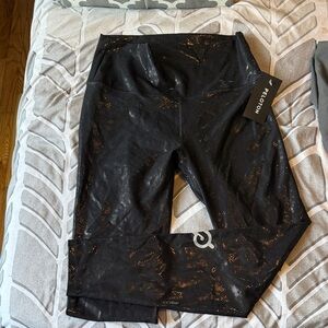 Peloton snakeskin Shimmering Black Leggings full length wear it to heart brand